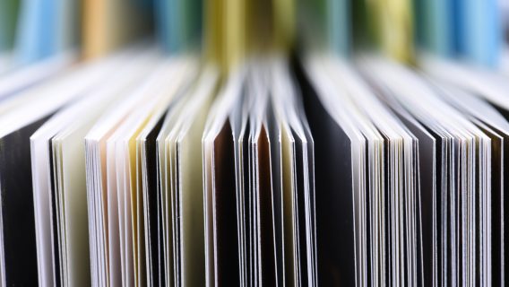 Closeup of the edge of open book pages.